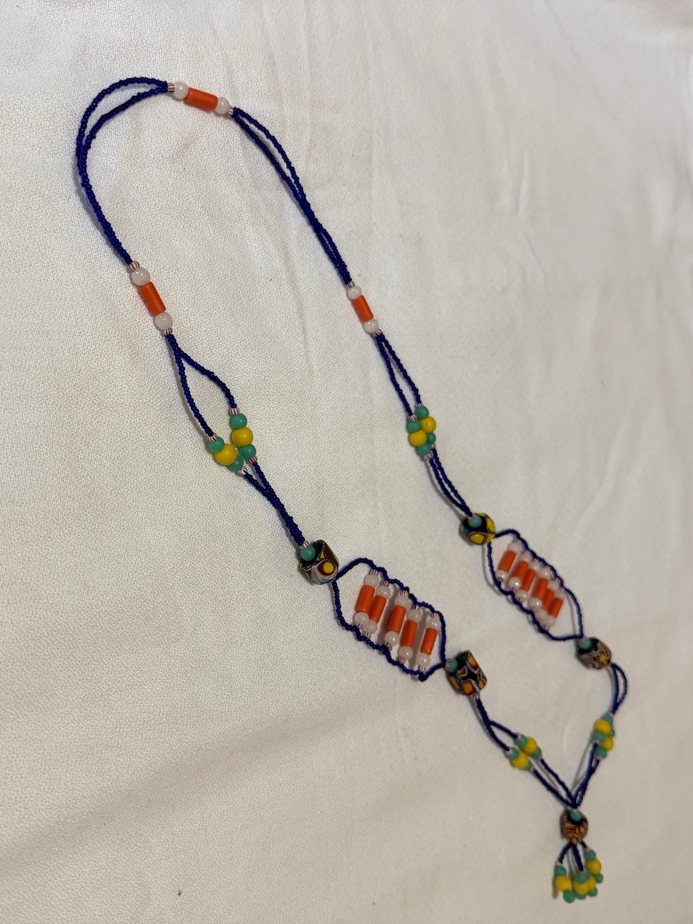 Handmade Beaded 32” Infinity Necklace with Orange and Blue Accents